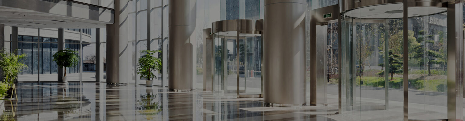 Cizek Associates lobby - glass and chrome with shiny floors