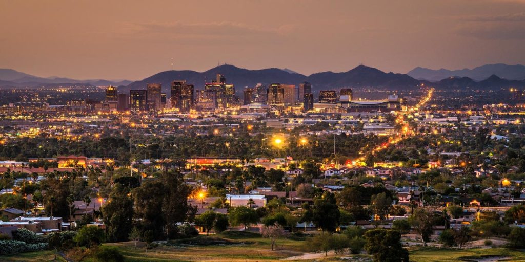 Phoenix AZ at sunset with purple mountains