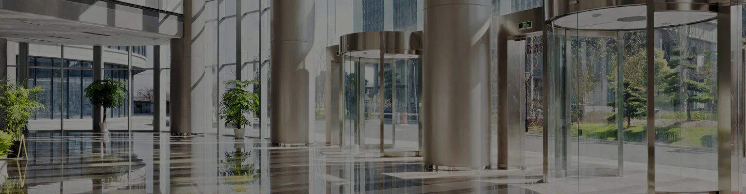 Cizek Associates lobby - glass and chrome with shiny floors