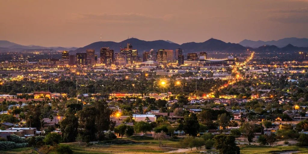 Phoenix AZ at sunset with purple mountains